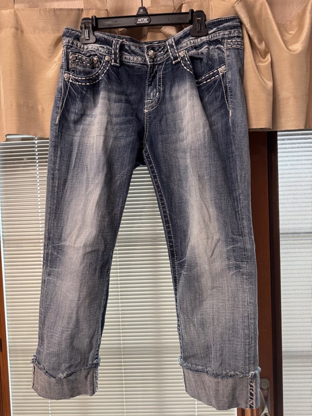 Miss Me Easy Cropped Distressed Jeans.